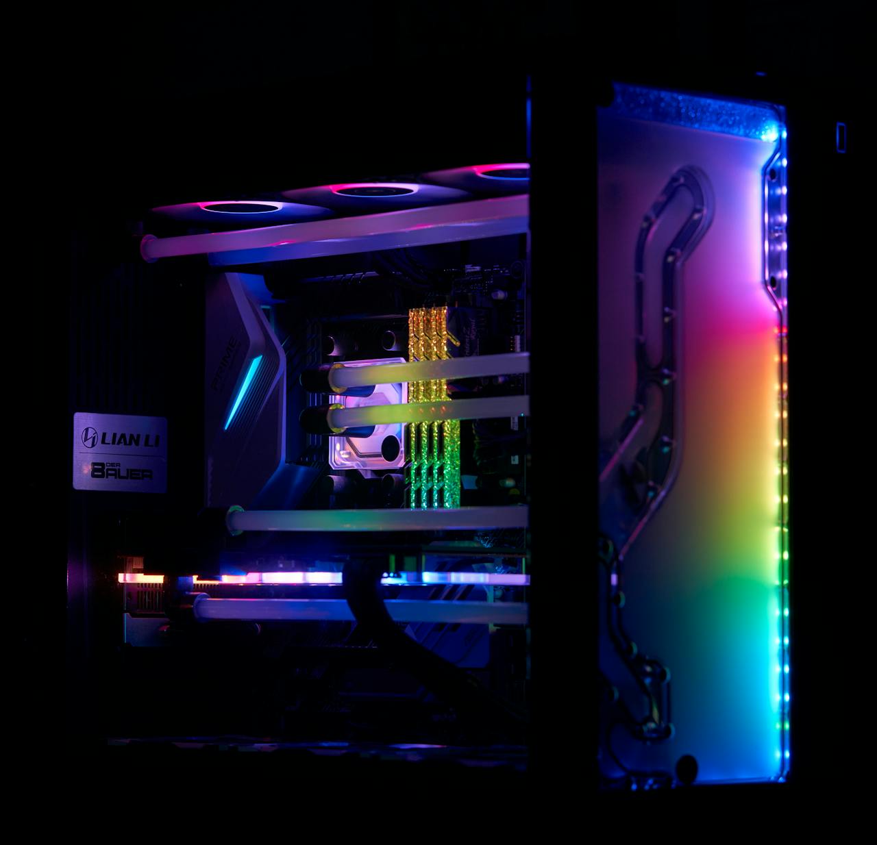 About A high-performance gaming PC with vibrant RGB lighting and visible internal components.